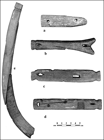 Different shaped wooden artifacts.