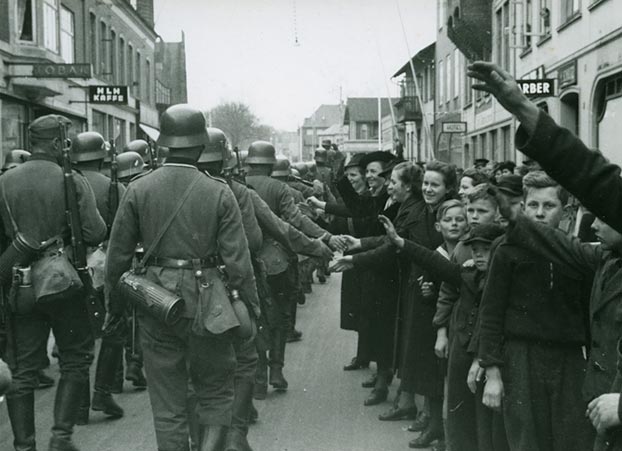 Inhabitants from the German minority in Denmark greet German soldiers in Aabenraa, April 1940. <br />(Photo by Ludwig von Münchow, Museum Sønderjylland, ISL-Lokalhistorie, Aabenraa, Denmark)