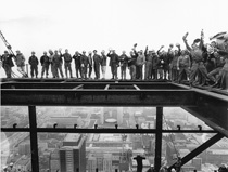 Workers wave from the top of the Toronto-Dominion Centre in 1966.