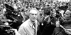 Tommy Douglas, outside Parliament, surrounded by media and crowd, Ottawa, April 22, 1971