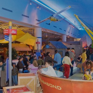 Visitors exploring the Port of Entry exhibition