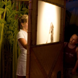 Kids playing with shadow puppets