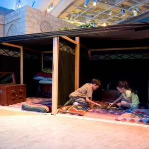 Children playing in a Bedouin tent