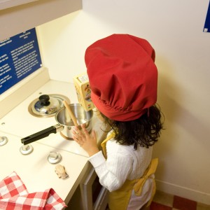 Child playing in the KIds' Café