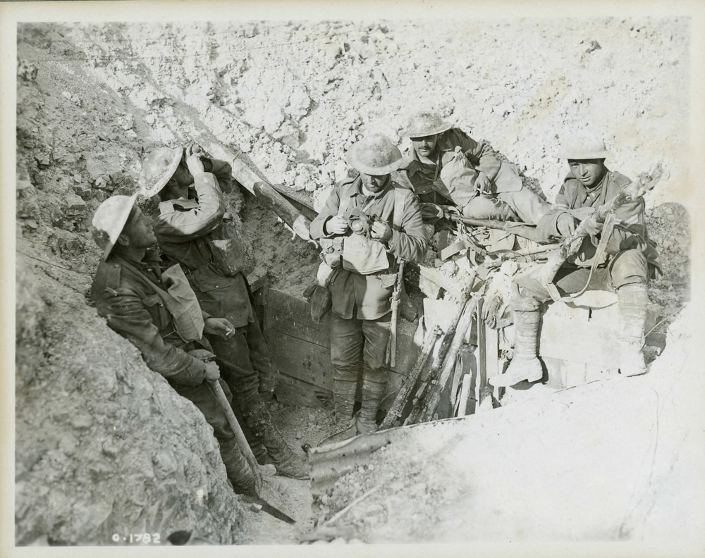 Black and white photo of soldiers in a captured trench