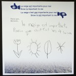A child's pencil drawing of a tulip, a sun, a fallen leaf and a snowlfake.