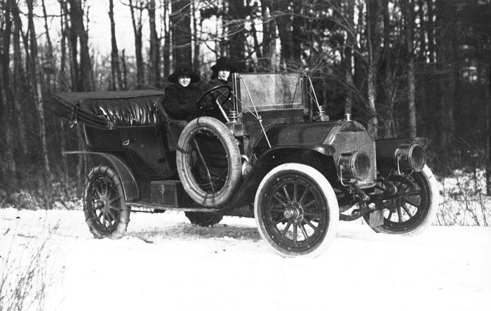 Women driving a Ford T in the snow