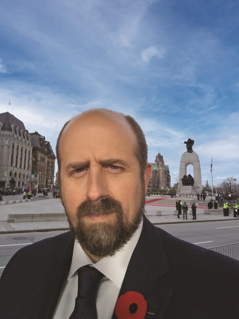 Image of Andrew Burtch in front of War Memorial, Ottawa