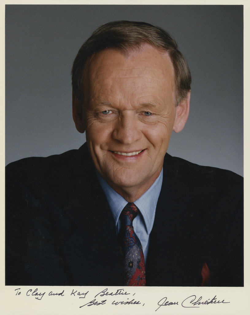 Head shot of Jean Chrétien in a suit from around 1995 with a dedication at the bottom