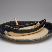Canoe on a lake - granite