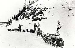 Fred Camsell, Charles Camsell, D.W. Wright and A.N. Pelly in the Liard River Canyon, En Route to Klondike, Yukon, January 1898
