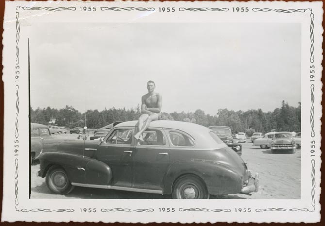 Chris Bennedsen on Erik Skov’s car, Wasaga Beach, Ontario, 1955