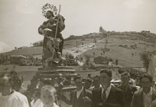  Religious procession in Monteleone di Puglia, possibly celebrating the feast of San Rocco, ca late 1950s. 