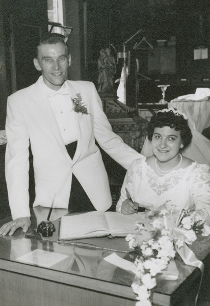 Chris and Connie signing the register on their wedding day, September 7, 1959
