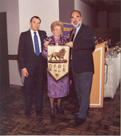 The late Professor Robert F. Harney accepts the Golden Lion pennant from the president of the Fiorente Lodge