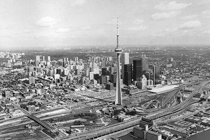 Aerial view of Toronto with the CN Tower dominating the landscape, 1980. 