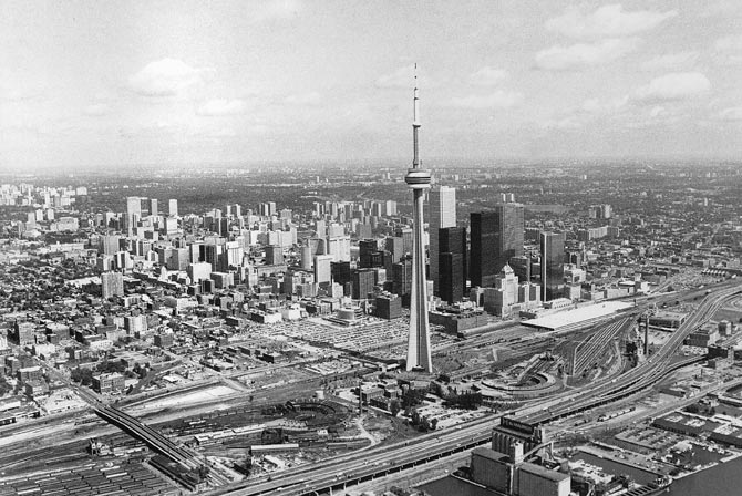Aerial view of Toronto with the CN Tower dominating the landscape, 1980