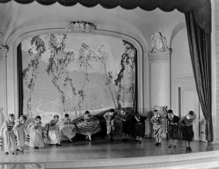 Young performers on stage dancing a round during the Canadian Folk Song and Handicrafts Festival at the Château Frontenac, Québec City, Québec, 1927., © CMC/MCC, Marius Barbeau, J-5106