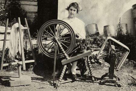 Anna April at work on the spinning wheel, Notre-Dame-du-Portage, Québec, 1918., © CMC/MCC, Marius Barbeau, B308-21.2