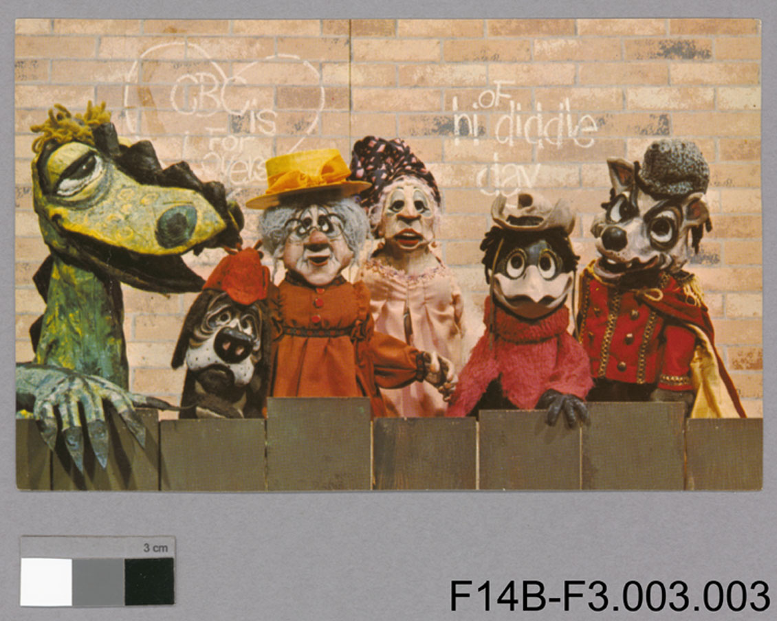 Postcard about Noreen Young's puppets from 