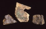 Tobacco pipes and fragments of a clay sagger