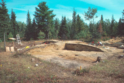 A mound getting dug out.