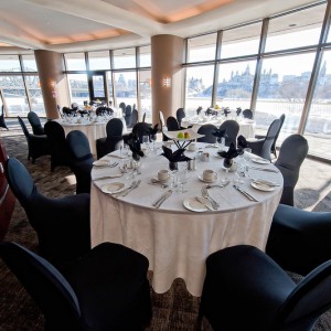 Tables and chairs in the River View Salon