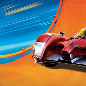 A red car is driving down a ramp.