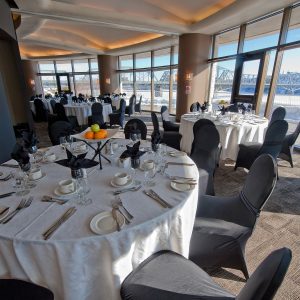 Tables and chairs in the River View Salon