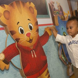 Child with Daniel Tiger