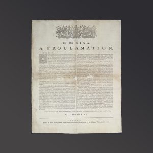 Document featuring a coat of arms and the words “By the King a Proclamation” and “God save the King.”