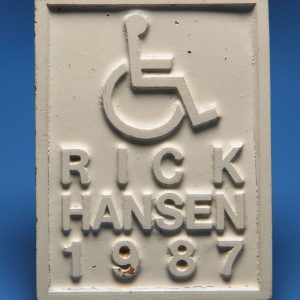 Stamp to mark concrete wheelchair ramps