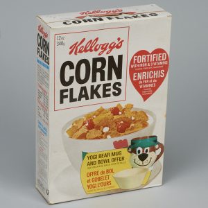 Cereal box featuring a bowl of Corn Flakes with text in English and French