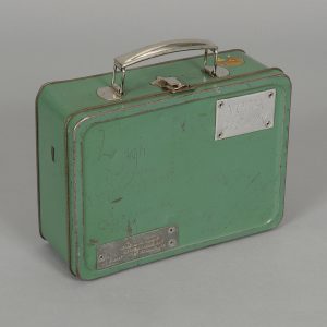 Green metal lunch box with a silver handle