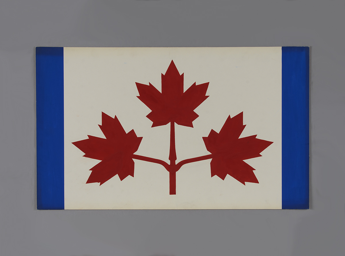 The Canadian Museum of History in Ottawa displays a flag with red leaves on it.