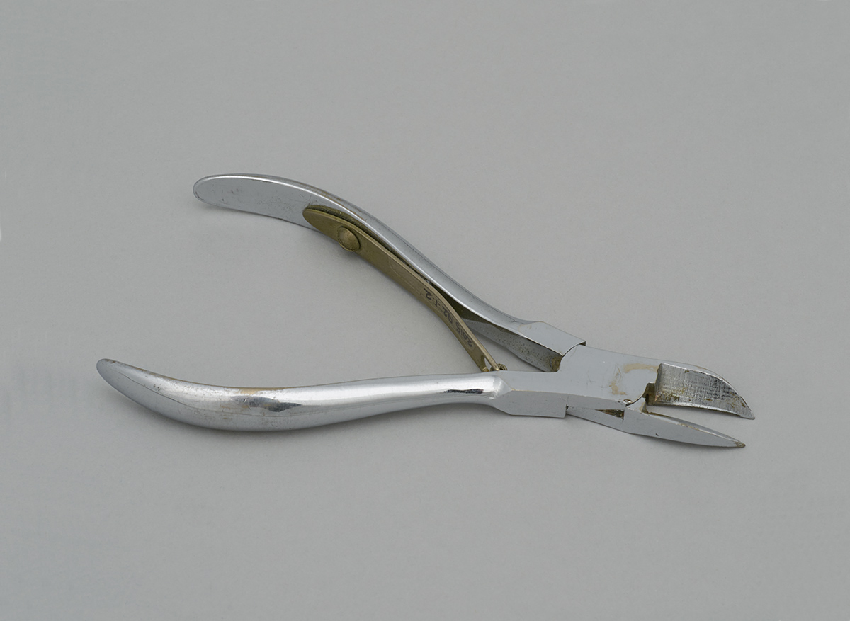 A pair of pliers on a white background at the Canadian Museum of History in Ottawa.