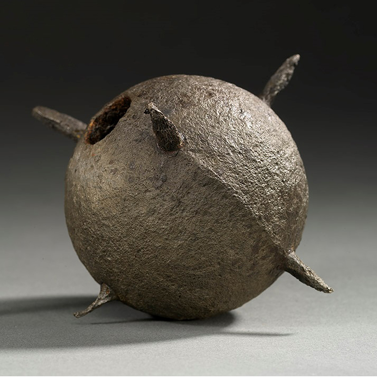 A metal ball with spikes on it displayed at the Canadian Museum of History in Ottawa.