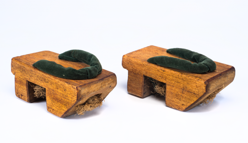 A pair of vintage wooden sandals