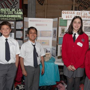 Four students with their projects