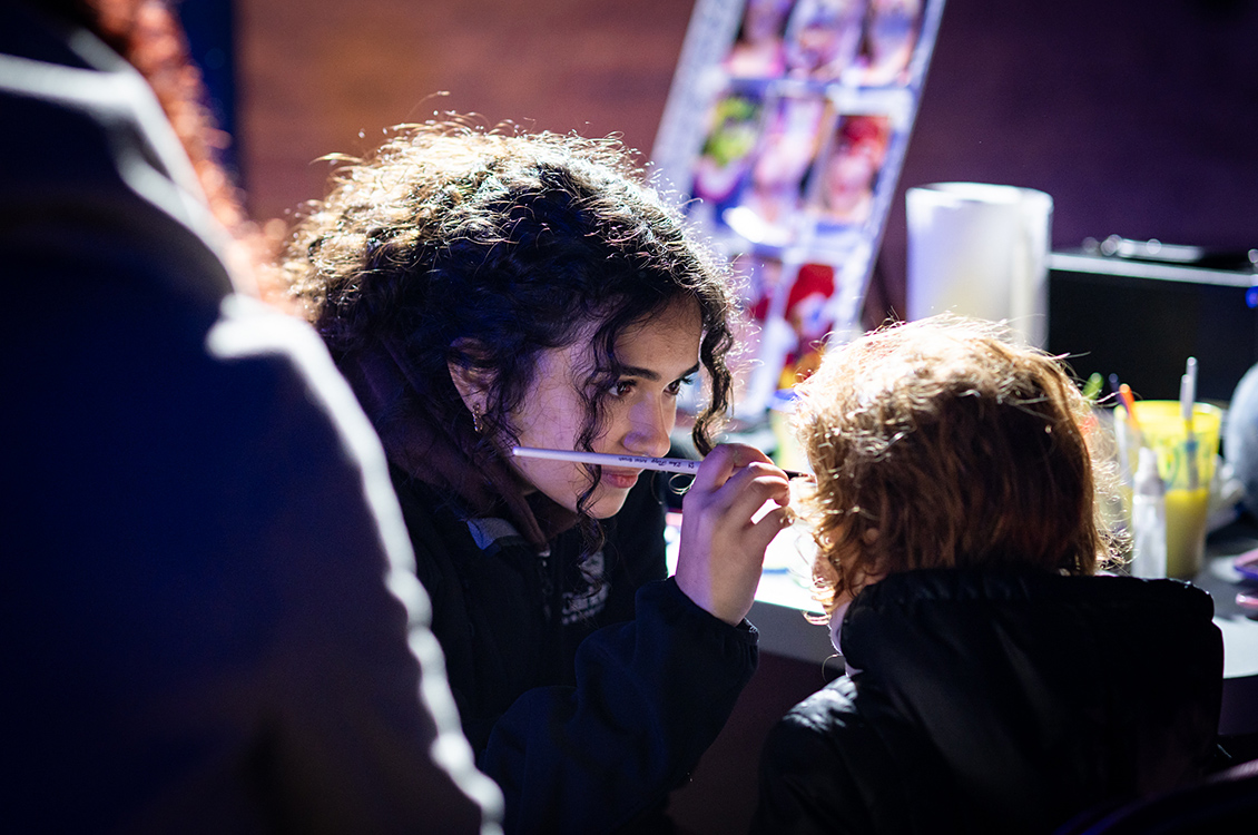 A face painter and a child