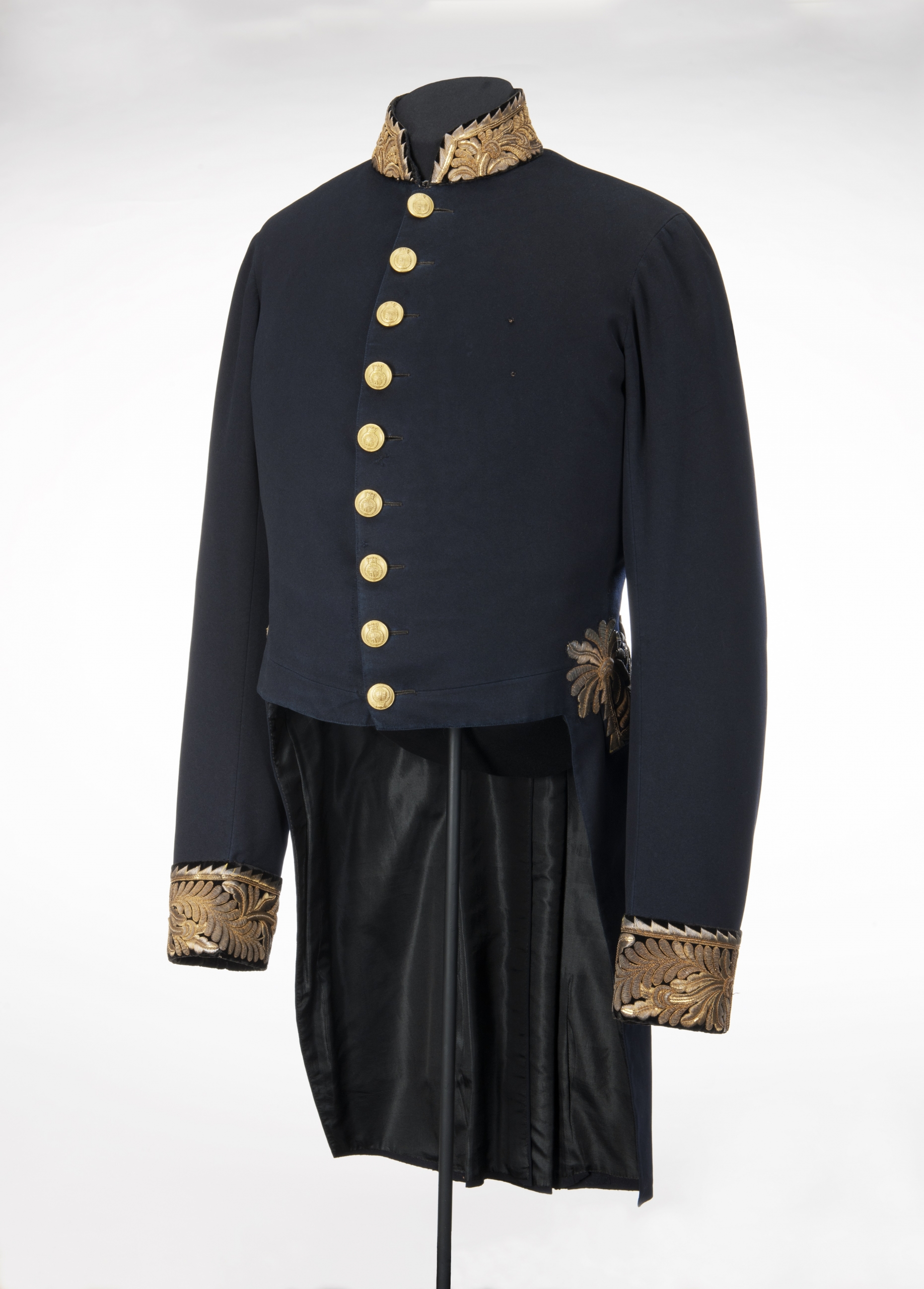 blue civil uniform jacket with gold cuffs and buttons.