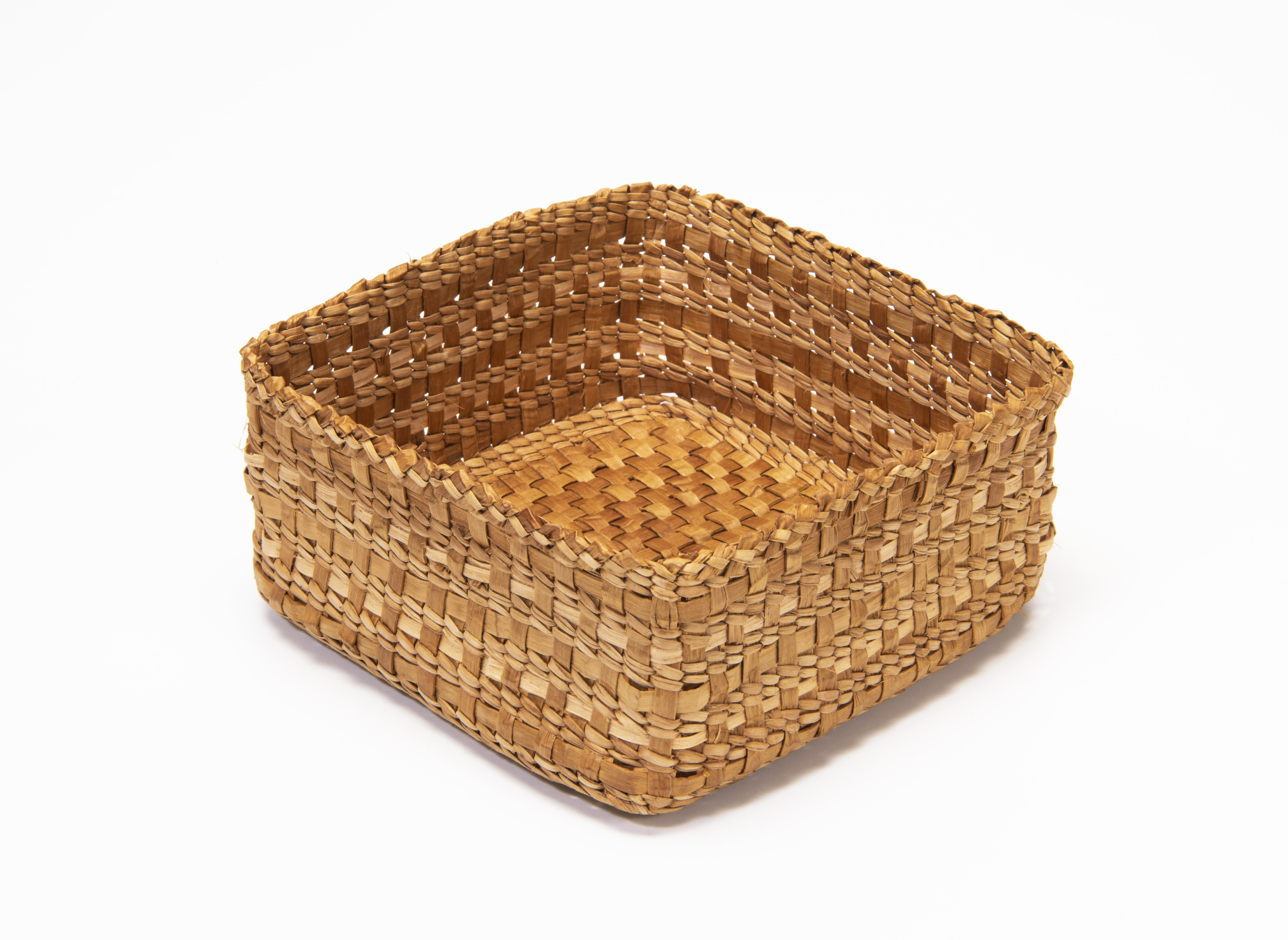 Small cedar basket in the process of being woven