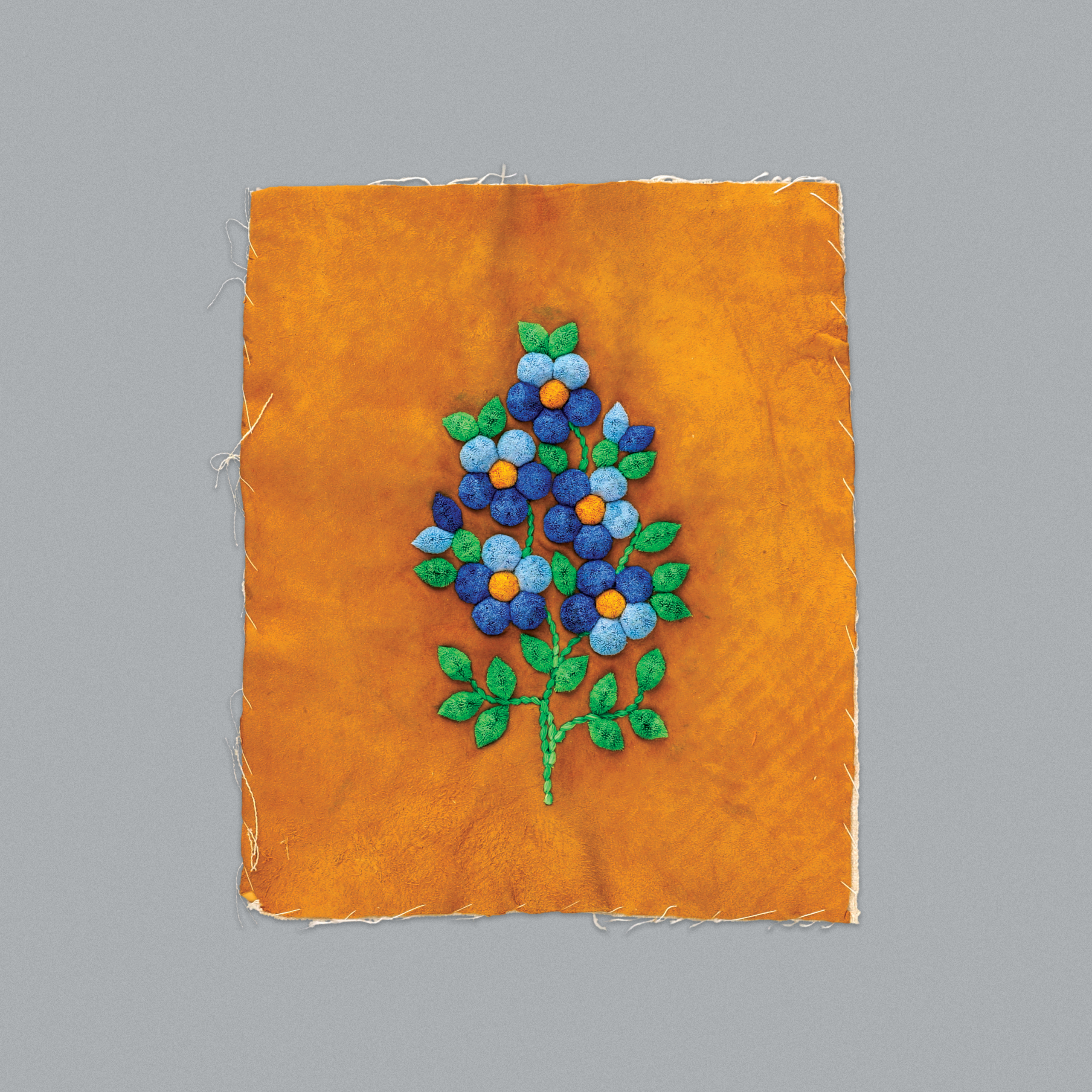 Floral designs made of moose hair tufting on a piece of hide