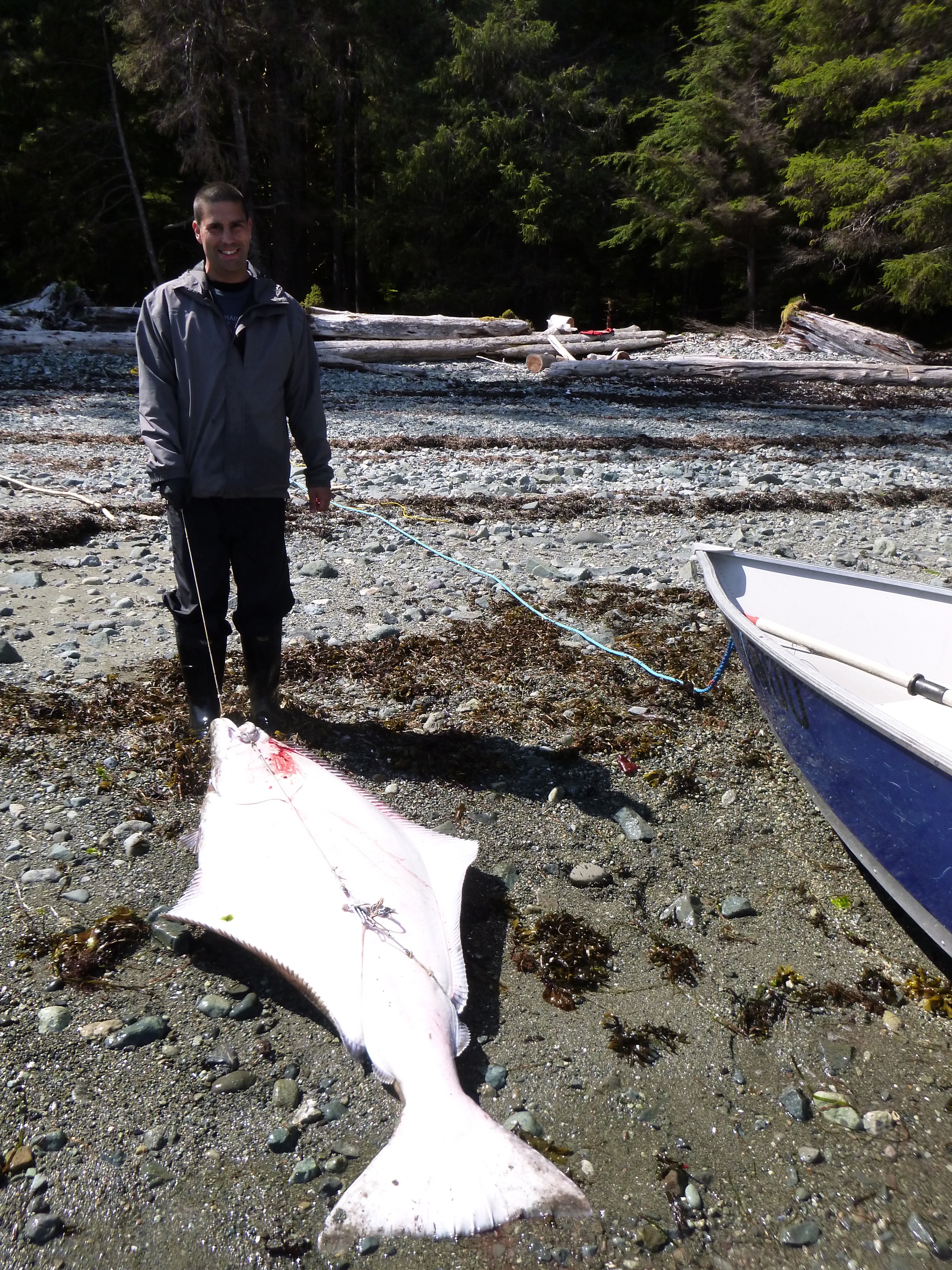 Man with a halibut fish