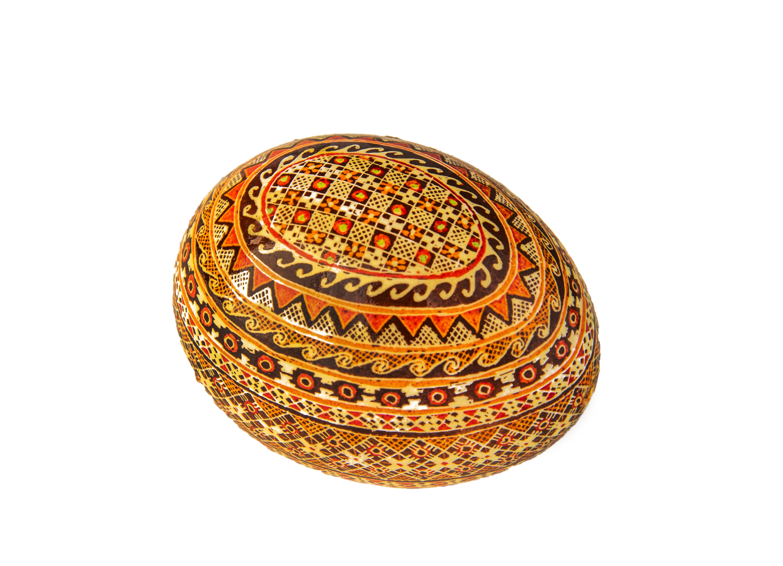 Egg with red, yellow and brown geometric patterns