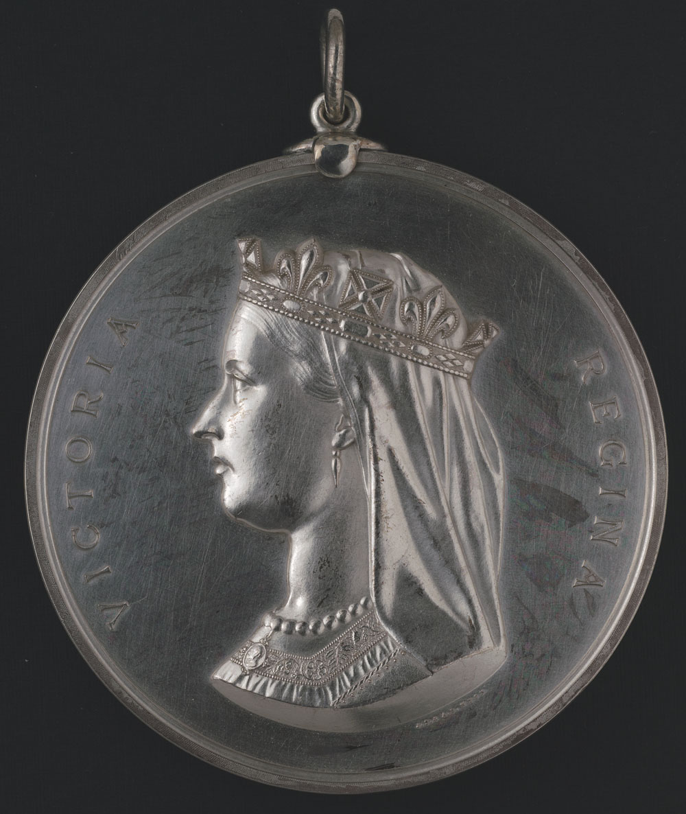 Silver medal featuring a bust of Queen Victoria