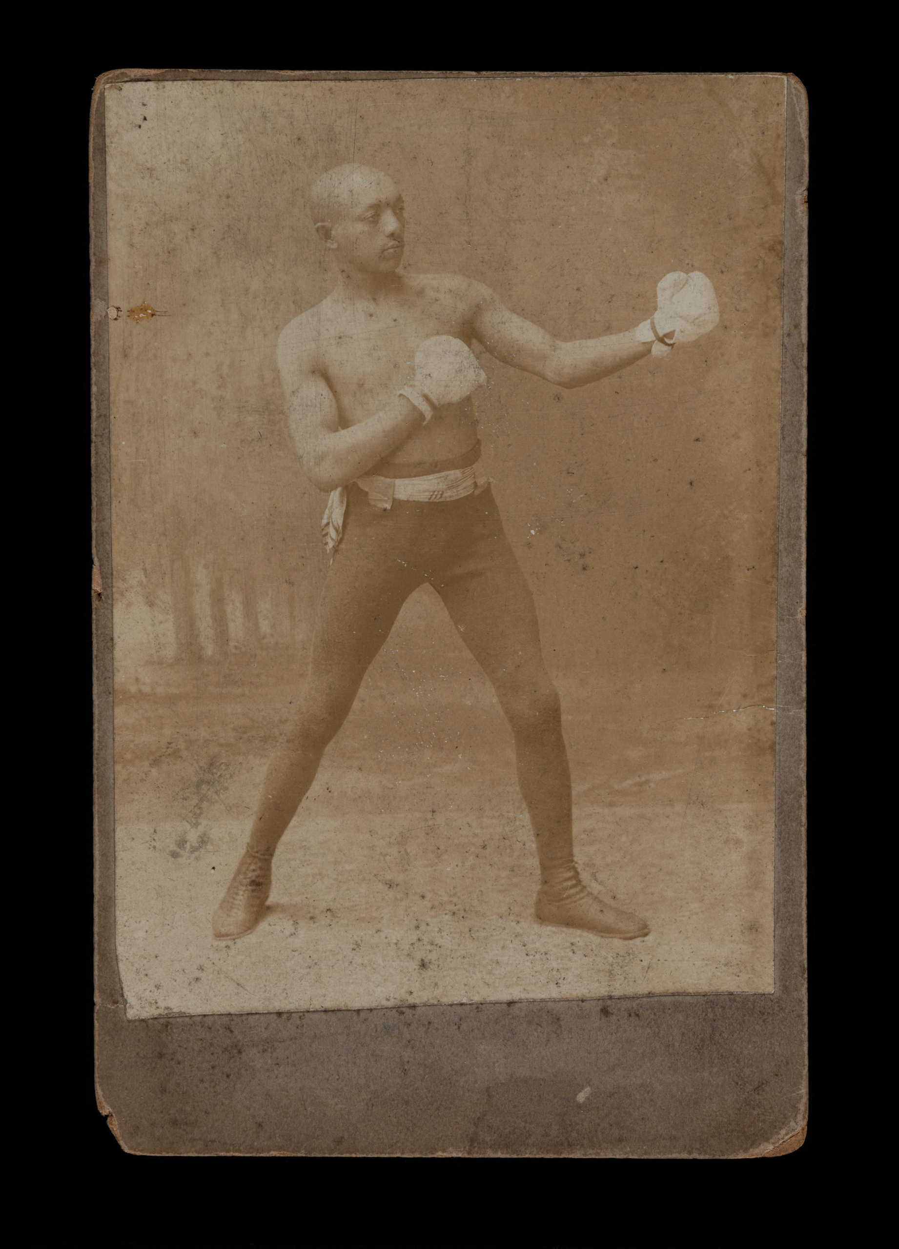 Black-and-white photograph of George Dixon in boxing stance. - 