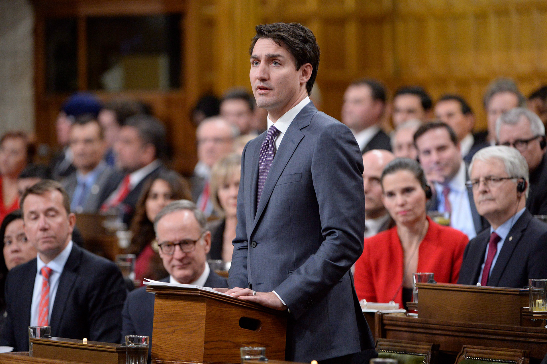 Prime Minister Justin Trudeau speaking at a podium.